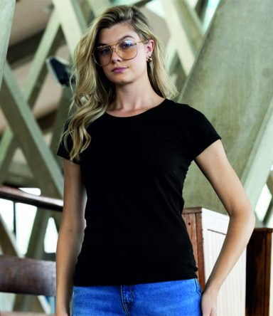 T-Shirts Woman with long blonde hair wearing a black t-shirt and glasses, posing indoors.